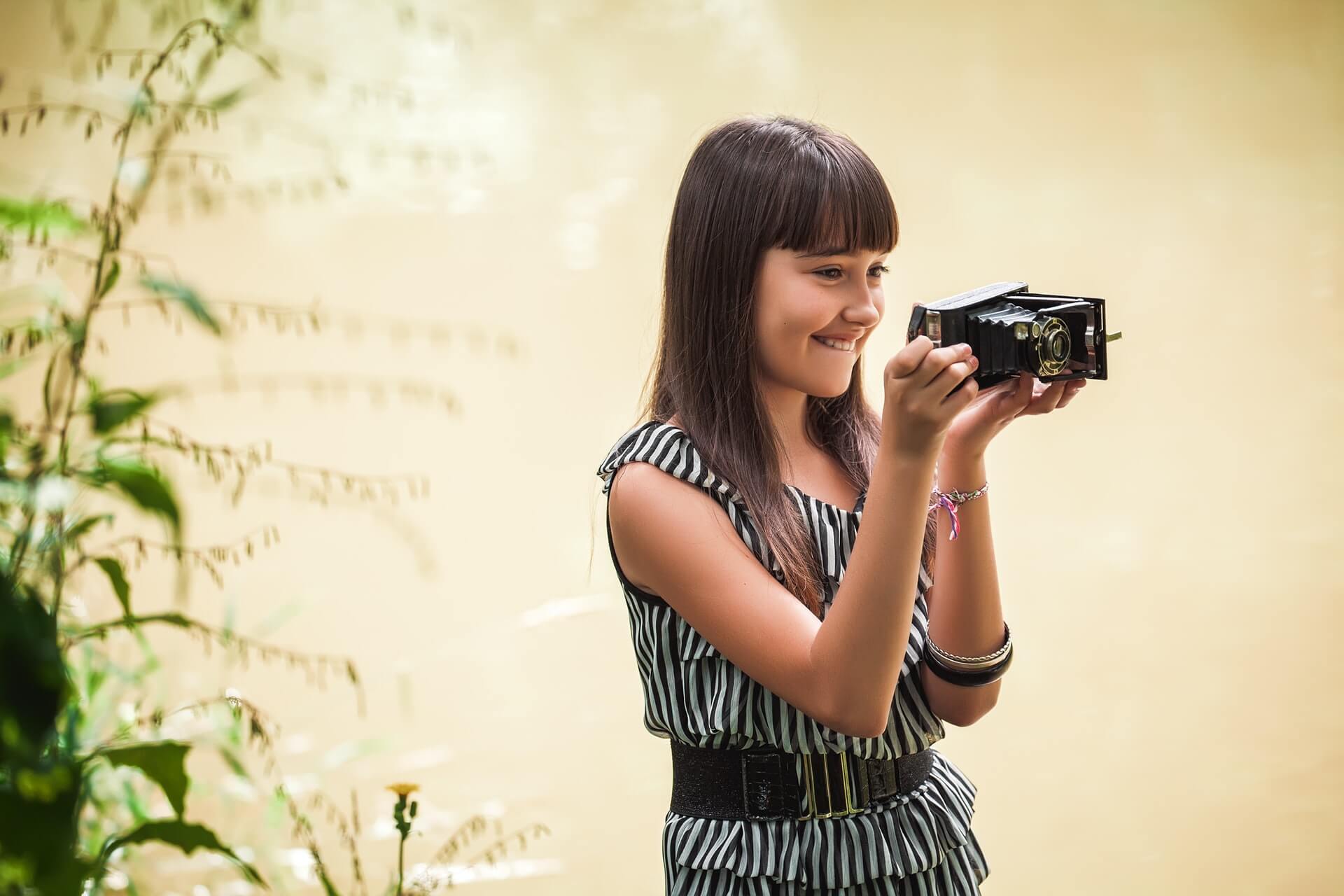 a person holding a camera