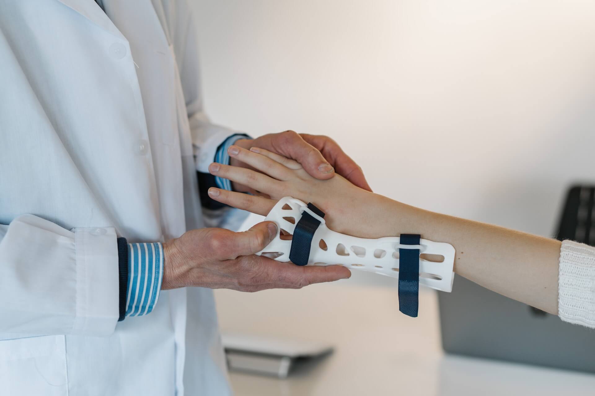 a close-up of a doctor holding a stethoscope